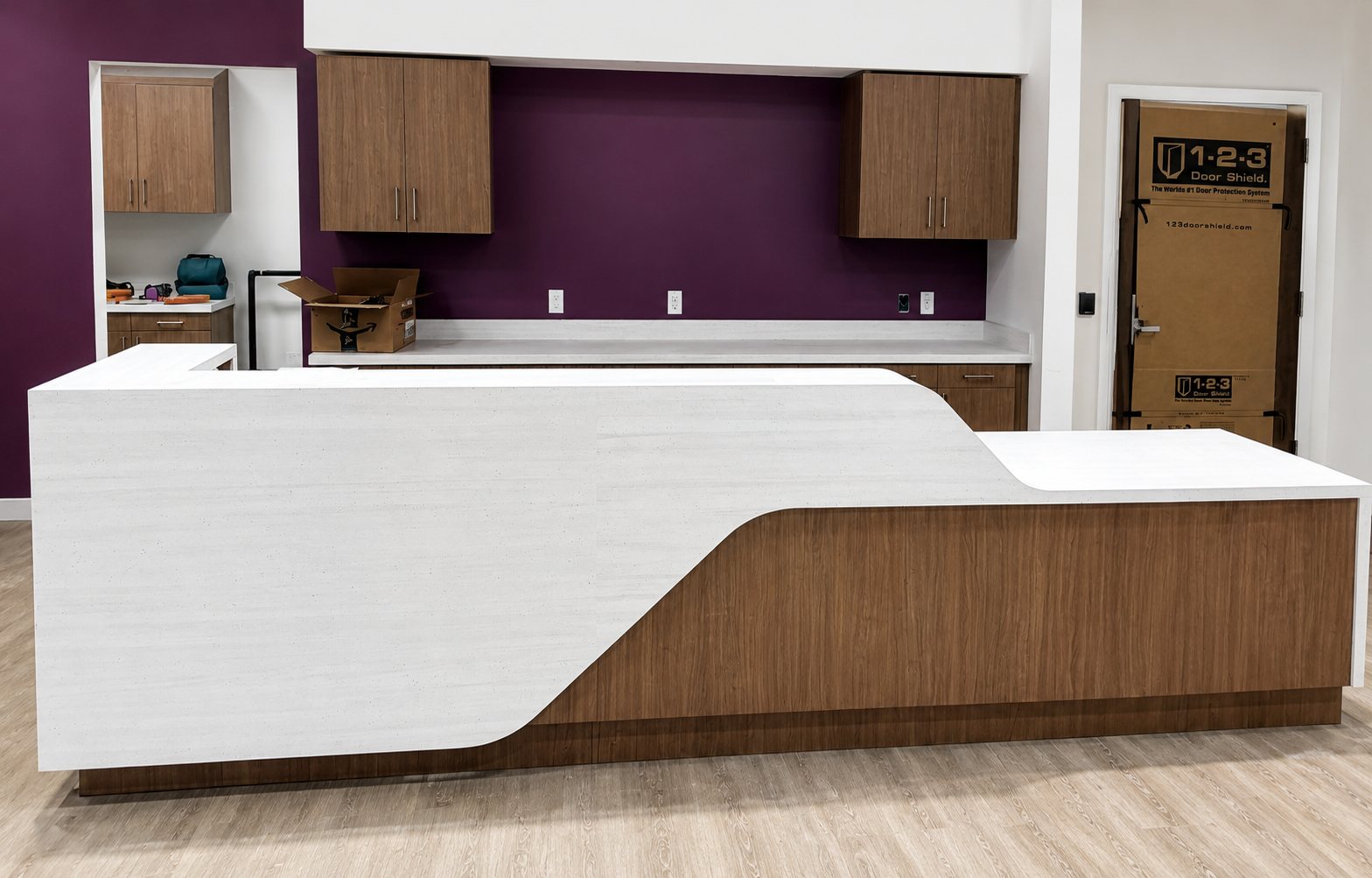 Custom reception desk with wood paneling