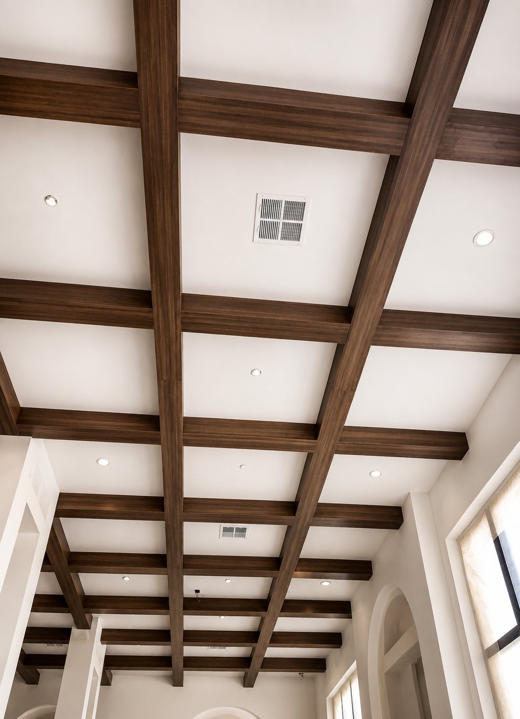 Walnut coffered beam ceiling with recessed lighting